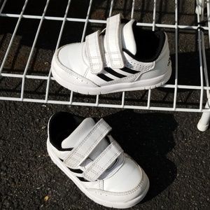 Adidas white sneakers.